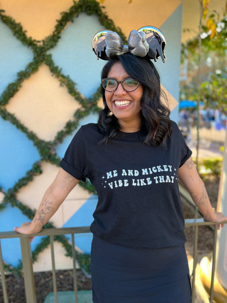 Woman wearing Me and Mickey vibe like that t-shirt graphic tee shirt disney disneyland disney world outfit cosplay disneybound top unisex men women taylor swift disney swiftie eras tour theme parks music lyrics mickey mouse minnie ears drop silver bow