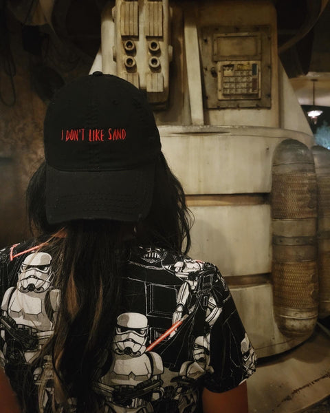 Anakin Skywalker Hat I Don't Like Sand Attack of the Clones Star Wars Movie Quote padme anidala prequels trilogy george lucas hayden christensen comic con meet and greet cosplay outfit gift fathers day mothers day galaxys edge darth vader stormtrooper shirt at galaxy's edge disney world florida