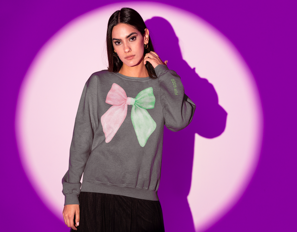 Pastel pink and green âWicked for Goodâ unisex sweatshirt with embroidered bow on chest and âfor goodâ sleeve embroidery, cozy cotton polyester blend, inclusive sizes Smallâ5XL. elphaba glinda sleeve for good pink green feminine coquette girly outfit matching green
