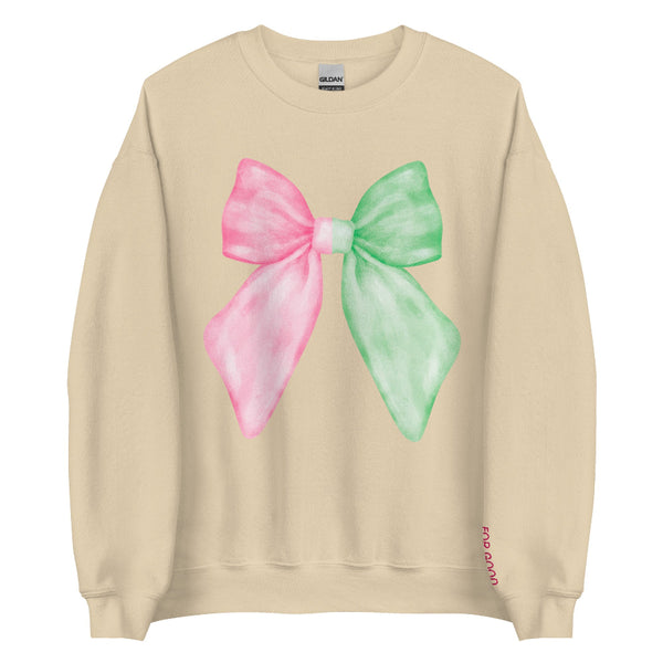 Pastel pink and green âWicked for Goodâ unisex sweatshirt with embroidered bow on chest and âfor goodâ sleeve embroidery, cozy cotton polyester blend, inclusive sizes Smallâ5XL. elphaba glinda sleeve for good pink green feminine coquette girly outfit matching