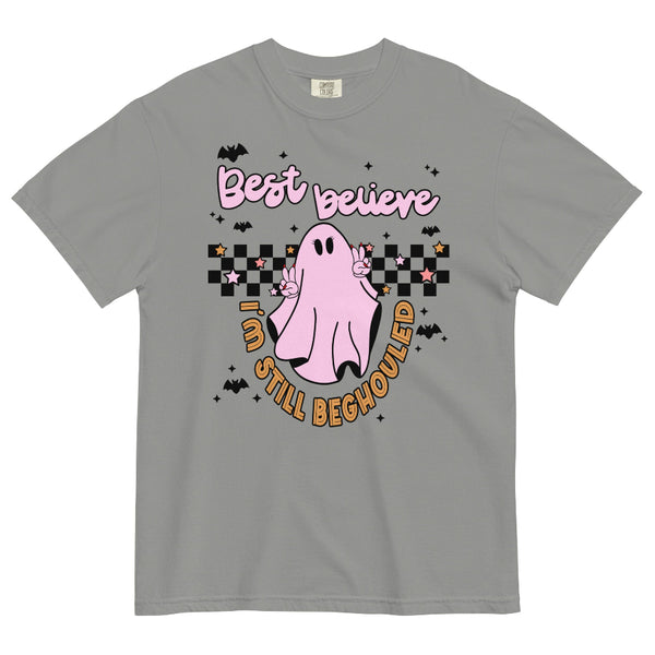 Purple graphic t-shirt with pink ghost making peace signs, black and white checkerboard background, bats, stars, and text ‘Best believe I’m still beghouled’ – cute Halloween Taylor Swift inspired tee. bejeweled midnights graphic tee taylor travis engaged gray grey