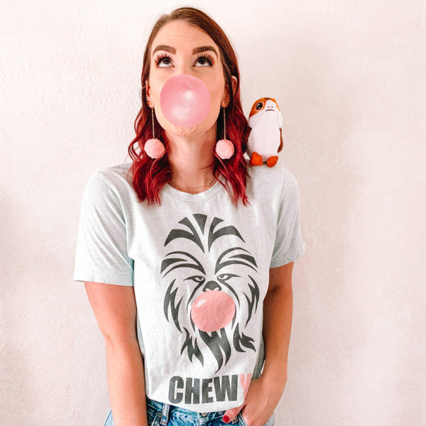 Chewbacca Bubblegum Shirt, chewy bubble trouble tee, for Wookiee Han Solo Star Wars trilogy fans. Pilot the millennium falcon on Smuggler's Run at disneyland California Hollywood Studios Orlando Florida Galaxy's Edge. Wear with your Batuu bound outfit. Unisex comfy fit, size inclusive XS-4XL. Worldwide shipping. Heather ice blue. Shoulder porg the last jedi