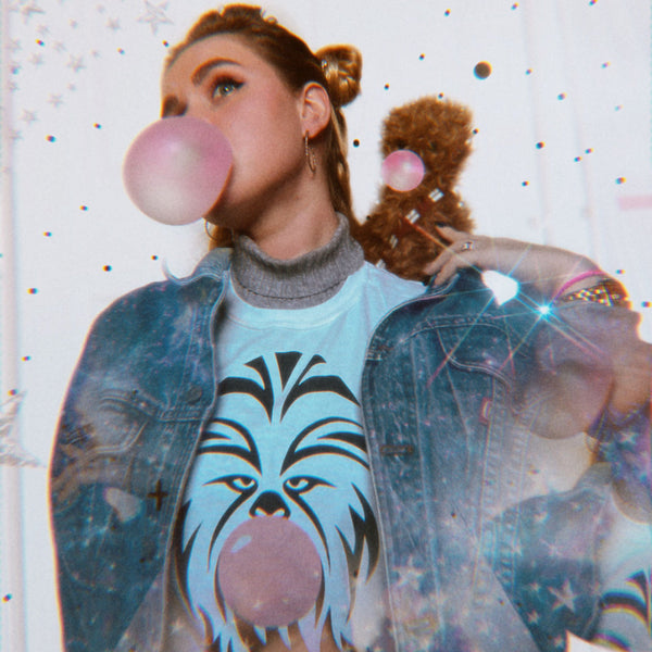 Chewbacca Bubblegum Shirt, chewy bubble trouble tee, for Wookiee Han Solo Star Wars trilogy fans. Pilot the millennium falcon on Smuggler's Run at disneyland California Hollywood Studios Orlando Florida Galaxy's Edge. Wear with your Batuu bound outfit. Unisex comfy fit, size inclusive XS-4XL. Worldwide shipping. White influencer photo edit stars