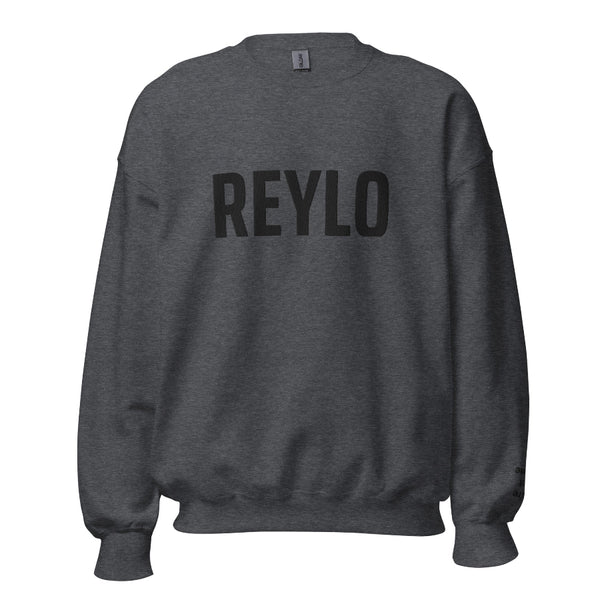 Embroidered sweatshirt that says REYLO on the front and you're not alone on the left sleeve. For Star Wars fans of Kylo Ren, Ben Solo and Rey. Shown in dark heather grey with black embroidery.