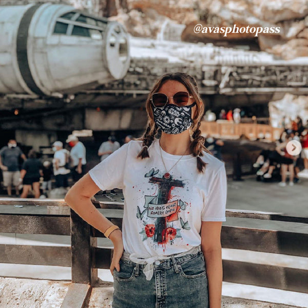 Kylo Ren Ben Solo Lightsaber Shirt Graphic Tee No One's Ever Really Gone Star Wars Sequels Novelization Quote Blue Butterfly Rey Nobody Skywalker Tattoo Graffiti Men Women Unisex Galaxy's Edge Disneyland Disney World Comic Con Cosplay Adam Driver Woman wearing a mask at Disneyland Resort Tshirt Knot