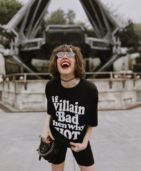 Woman wearing the If Villain Bad Then Why Hot graphic tee t-shirt unisex cotton hot villain outfit cosplay top star wars loki acotar rhysand booktok books reading fictional character boyfriend at Galaxy's Edge Disneyland California star wars theme park sunglasses fanny pack Tessa Netting