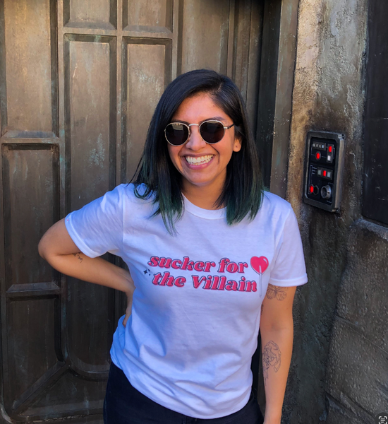 White unisex t-shirt with “Sucker for the Villain” Valentine design