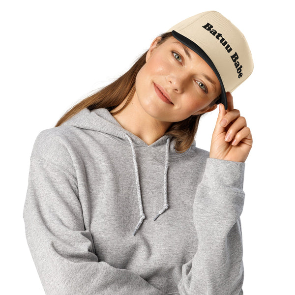 Batuu Babe embroidered two-tone trucker hat featuring black embroidery on a cream front panel with black brim, inspired by Galaxy's Edge and Disney park outfits.