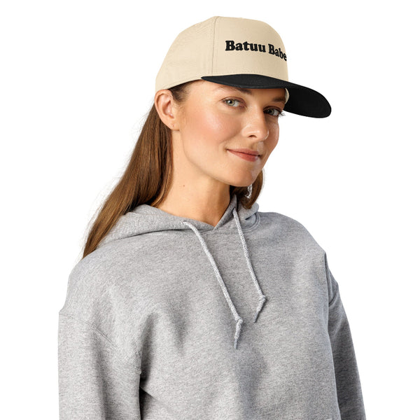 Batuu Babe embroidered two-tone trucker hat featuring black embroidery on a cream front panel with black brim, inspired by Galaxy's Edge and Disney park outfits.
