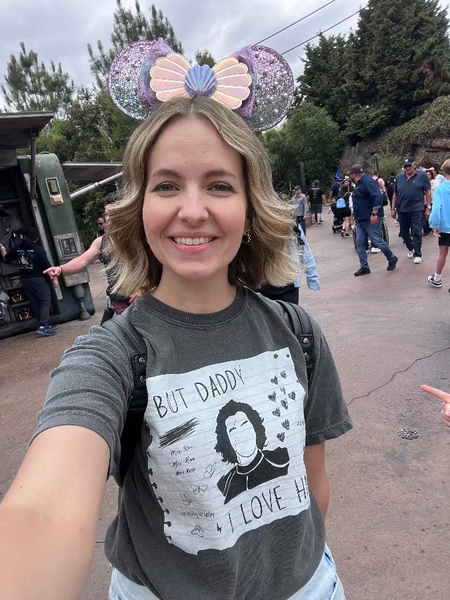 Woman wearing Kylo Ren Comfort Colors shirt at Galaxy's Edge in Disneyland