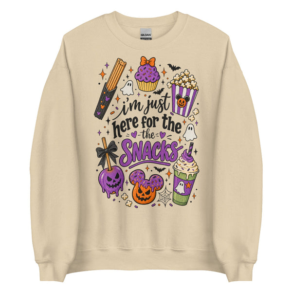 I’m Just Here for the Snacks Halloween sweatshirt featuring spooky theme park inspired treats in purple, orange and black.