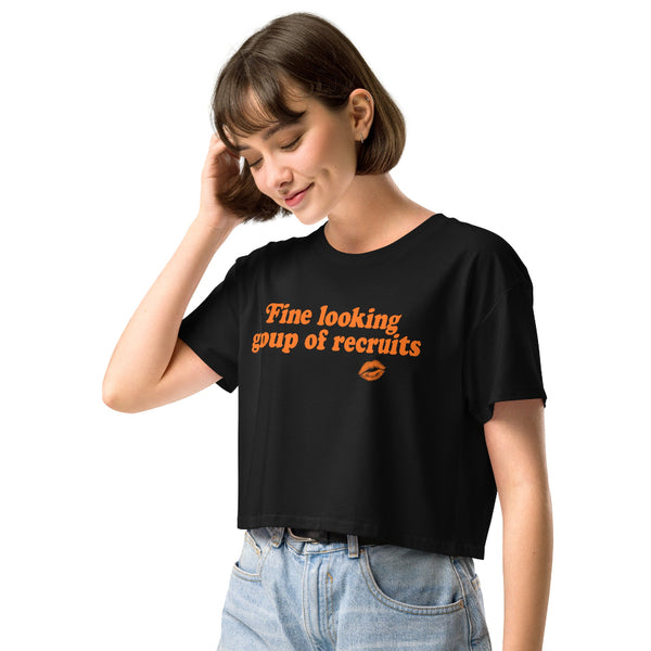 Black cropped graphic t-shirt with distressed orange “Fine Looking Group of Recruits” lettering and small kiss graphic.