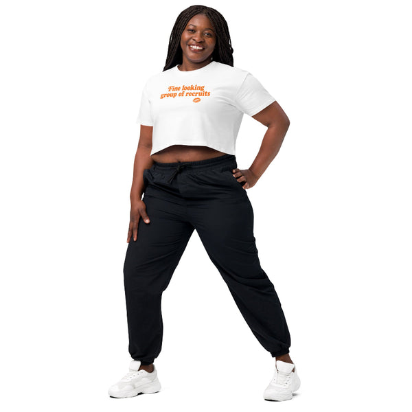 White cropped graphic t-shirt with distressed orange “Fine Looking Group of Recruits” lettering and small kiss graphic.