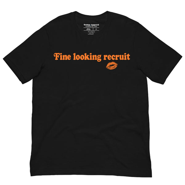Woman wearing a white unisex graphic t-shirt with distressed orange text reading “Fine Looking Recruit” and a small orange kiss graphic. rise of the resistance shirt