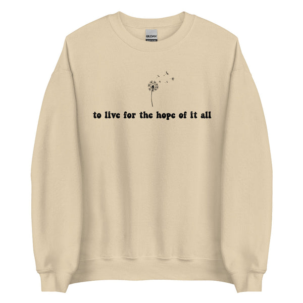 Beige folklore-inspired sweatshirt with “to live for the hope of it all” text and delicate dandelion design