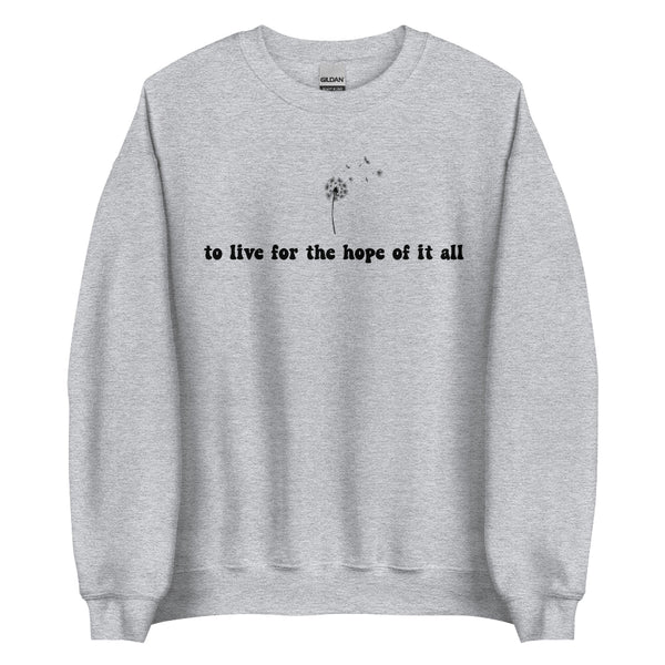 Gray folklore-inspired sweatshirt with “to live for the hope of it all” text and delicate dandelion design