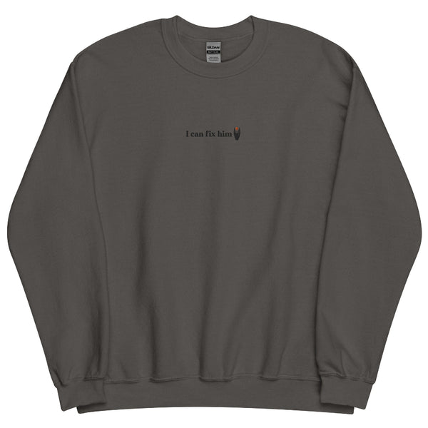 Dark gray unisex embroidered sweatshirt featuring the phrase "I can fix him" stitched in small black lettering on the left chest. Minimalist fantasy-inspired embroidered crewneck for Lord of the Rings fans.