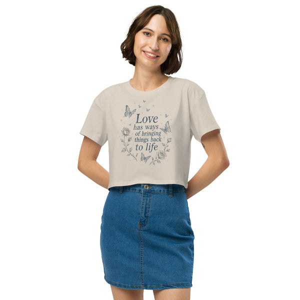 Love Has Ways Butterfly women’s cropped t-shirt featuring blue butterflies and a hopeful inspirational quote
