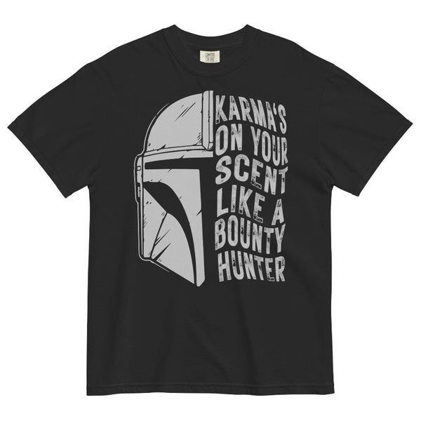 A black short-sleeve crewneck t-shirt featuring a distressed white graphic of the Mandalorian helmet next to the text 'KARMA'S ON YOUR SCENT LIKE A BOUNTY HUNTER'.