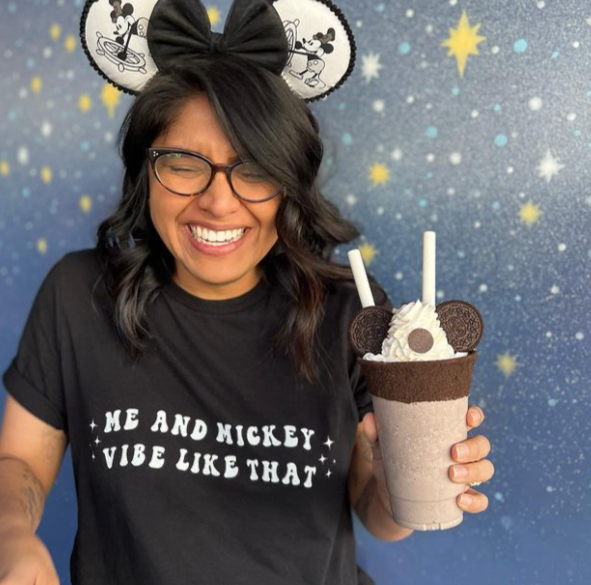 Swiftie inspired Disney graphic t-shirt with Karma themed magical park design