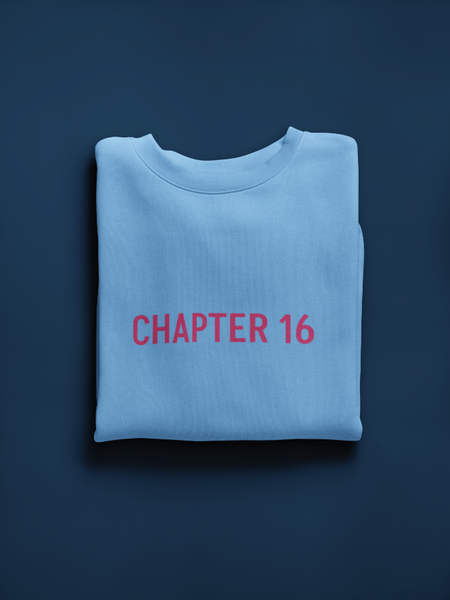 Unisex crewneck sweatshirt with a small romance book quote embroidered across the center chest.