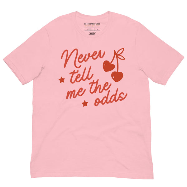 Pink unisex t-shirt with red “Never Tell Me the Odds” text and cherry graphic inspired by Star Wars