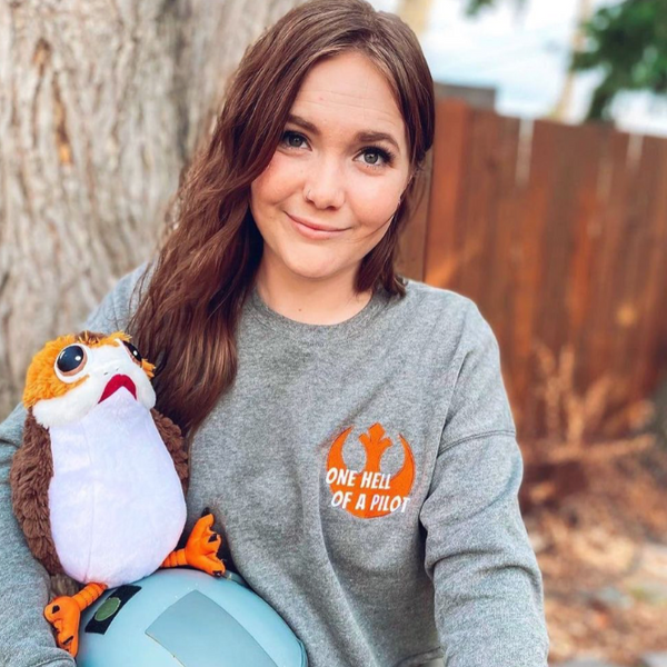 Minimal embroidered One Hell Of A Pilot sweatshirt inspired by Poe Dameron