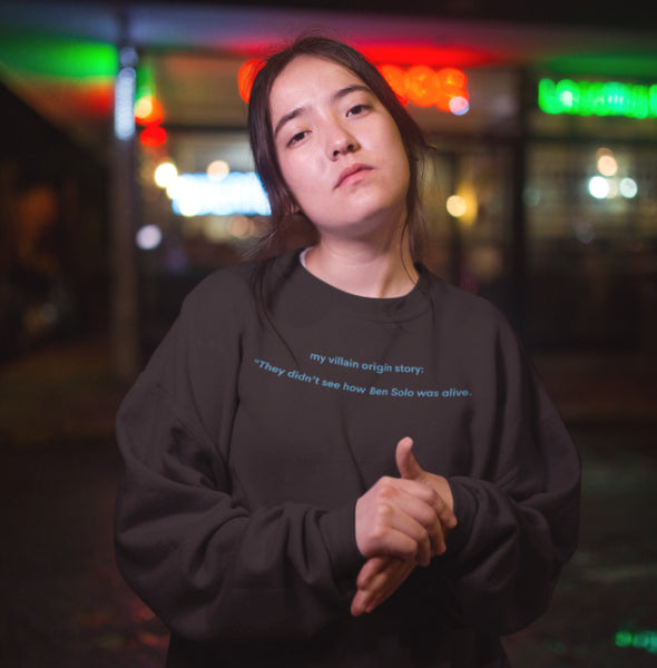 woman wearing villain origin story the hunt for ben solo sweatshirt black blue star wars kylo ren adam driver steven soderbergh quiet leaves star wars movie sequels rey jedi lightsaber dark side the knights of ren reylo