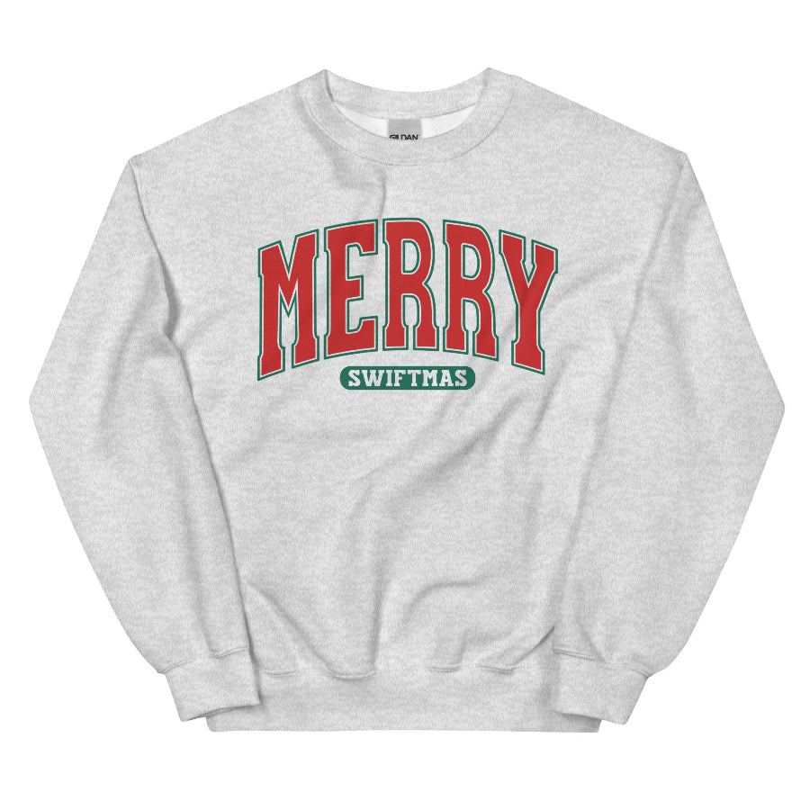 Gray unisex sweatshirt with varsity-style “Merry Swiftmas” text in red and green.