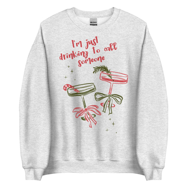 Sabrina Carpenter Christmas sweater holiday party go go juice house tour mans best friend short n sweet. Cream unisex sweatshirt with pink and green holiday cocktail illustrations, bows, candy cane, rosemary garnish, sparkles, and text reading “I’m just drinking to call someone,” printed on cotton-poly crewneck Small-5XL.