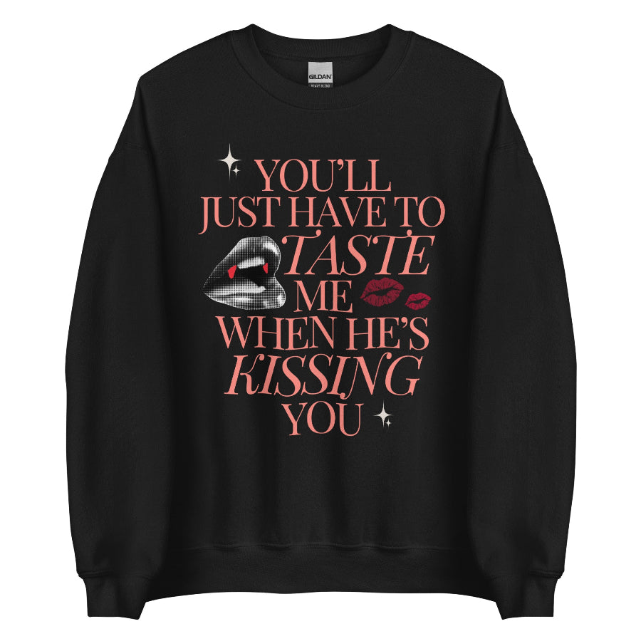 Taylor Swift vampire lyric sticker – black lips with fangs, red lipstick kiss marks, and text ‘You’ll just have to taste me when he’s kissing you’ – gothic Halloween. black sweatshirt with pink design sabrina carpenter taste mans best friend tears
