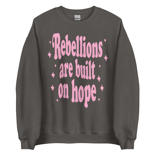 Unisex sweatshirt with “Rebellions Are Built on Hope” text in a soft, Star Wars-inspired design.