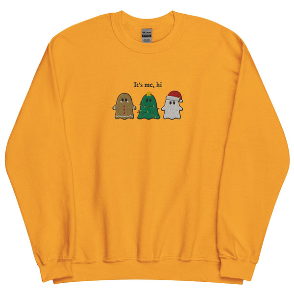 “It’s Me, Hi” embroidered Christmas sweatshirt showing three festive ghost characters—a gingerbread ghost, a Christmas-tree ghost with lights, and a Santa ghost—stitched on a sage green unisex crewneck. Taylor Swift swift midnights anti hero music lyrics holiday gift