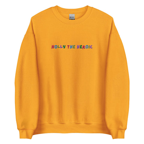 Mustard yellow unisex embroidered sweatshirt with colorful stitched text reading ‘Holly the Heroic,’ Stranger Things inspired Holly Wheeler fan design.