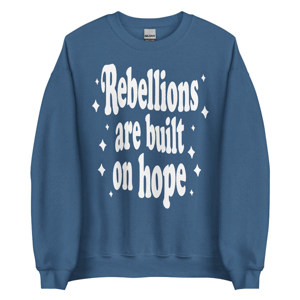 Unisex sweatshirt with “Rebellions Are Built on Hope” text in a soft, Star Wars-inspired design.
