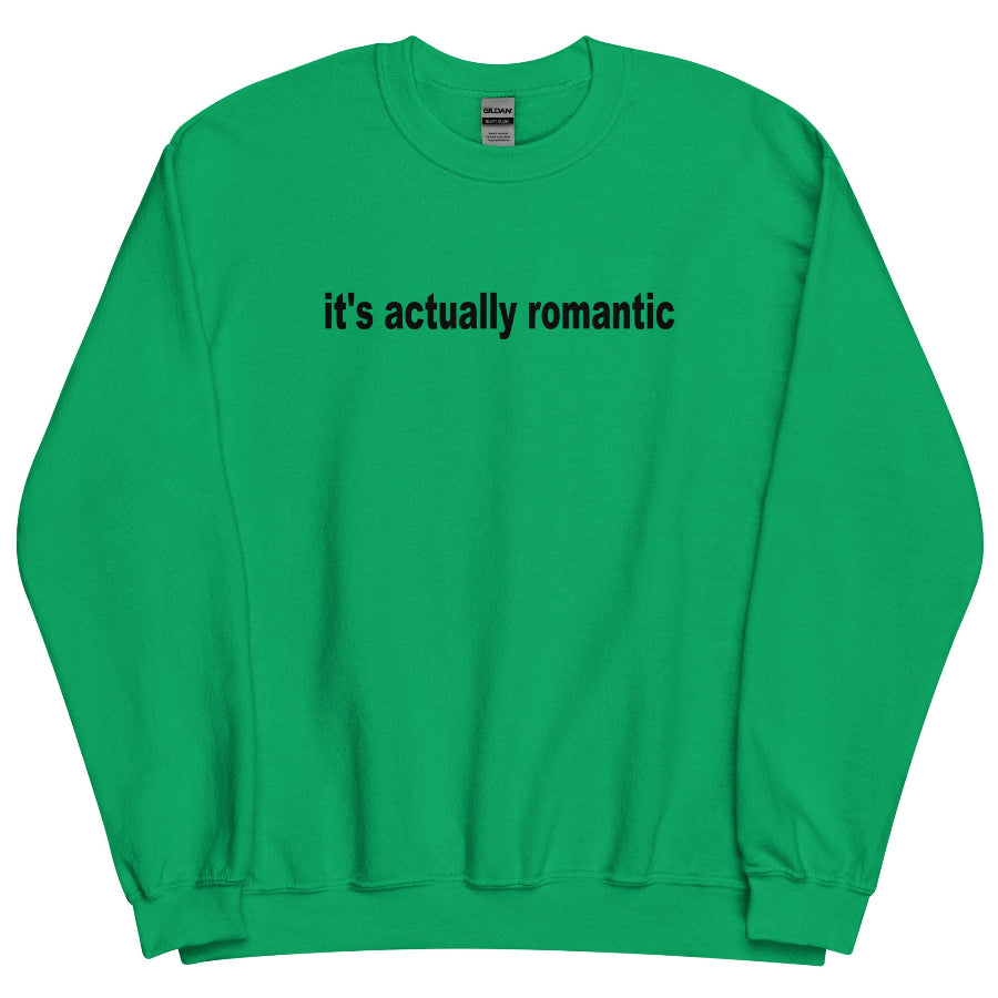 Light green ‘It’s Actually Romantic’ unisex sweatshirt, minimalist Swiftie and Charli XCX inspired lyric design, cozy cotton polyester blend, inclusive sizing Small–4XL. charli xcx taylor swift sympathy is a knife matty healy george drama feud celebrity battle taylor swift drama