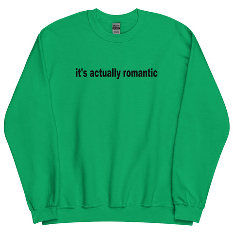 Light green ‘It’s Actually Romantic’ unisex sweatshirt, minimalist Swiftie and Charli XCX inspired lyric design, cozy cotton polyester blend, inclusive sizing Small–4XL. charli xcx taylor swift sympathy is a knife matty healy george drama feud celebrity battle taylor swift drama