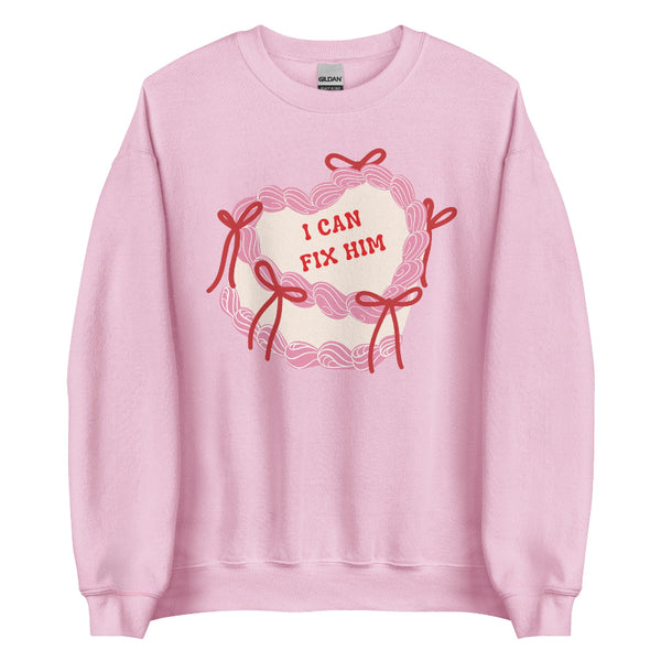Coquette Valentine sweatshirt with pink cake, bows, and “I can fix him” phrase inspired by hot villain romantasy vibes