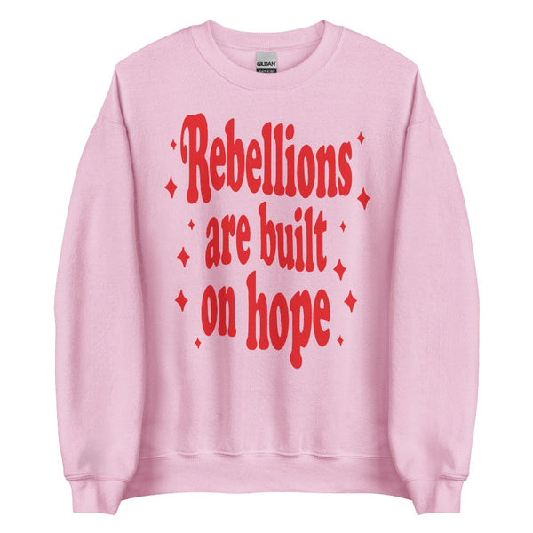 Unisex sweatshirt with “Rebellions Are Built on Hope” text in a soft, Star Wars-inspired design.