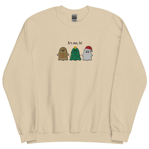 “It’s Me, Hi” embroidered Christmas sweatshirt showing three festive ghost characters—a gingerbread ghost, a Christmas-tree ghost with lights, and a Santa ghost—stitched on a sage green unisex crewneck. Taylor Swift swift midnights anti hero music lyrics holiday gift
