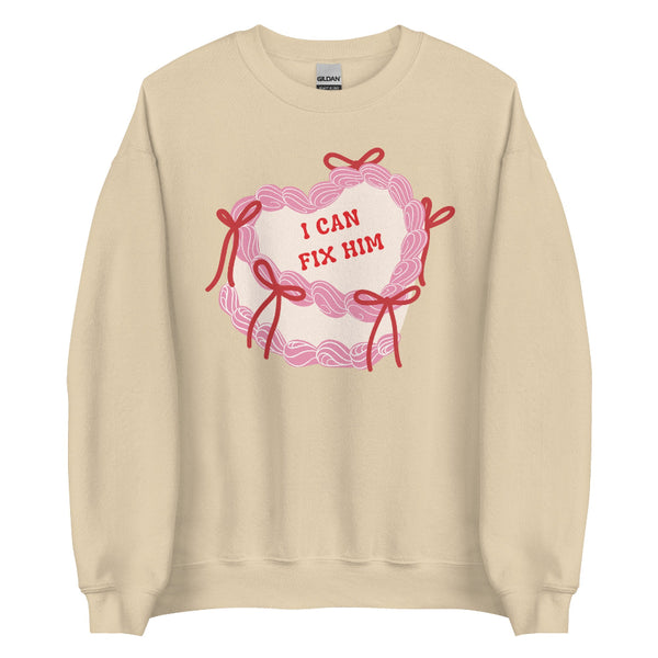 Coquette Valentine sweatshirt with pink cake, bows, and “I can fix him” phrase inspired by hot villain romantasy vibes