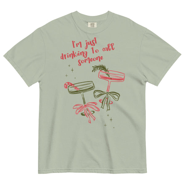 Comfort Colors ivory t-shirt with illustrated pink and green cocktails, bows, sparkles, and text “I’m just drinking to call someone,” printed on garment-dyed cotton tee S–4XL. Sabrina Carpenter Christmas holiday graphic tee house tour short n sweet go go juice mans best friend. music lyrics quotes