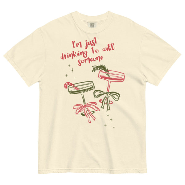 Comfort Colors ivory t-shirt with illustrated pink and green cocktails, bows, sparkles, and text “I’m just drinking to call someone,” printed on garment-dyed cotton tee S–4XL. Sabrina Carpenter Christmas holiday graphic tee house tour short n sweet go go juice mans best friend. music lyrics quotes