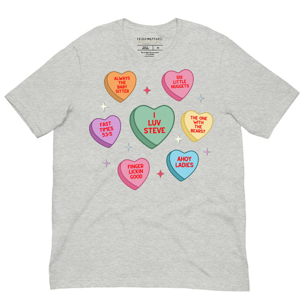 Unisex gray t-shirt with Steve Harrington inspired candy heart Valentine design featuring “I Luv Steve” and retro sayings