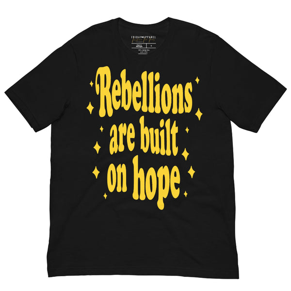 Unisex graphic t-shirt with pink lettering that reads “Rebellions Are Built on Hope,” inspired by sci-fi rebellion themes.