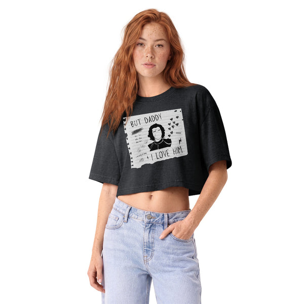 Woman wearing a vintage garment-dyed cropped tee featuring the phrase "But Daddy I Love Him: Kylo's Version." Relaxed washed Bella + Canvas cropped t-shirt inspired by Ben Solo, Reylo, Galaxy's Edge outfits, and subtle fandom fashion.
