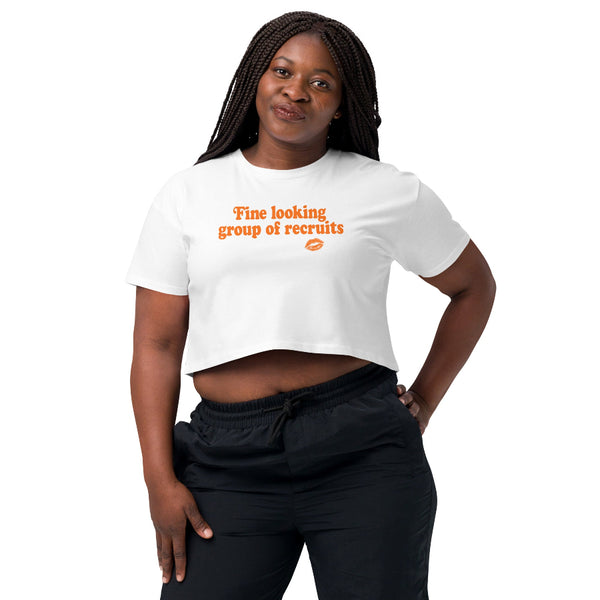White cropped graphic t-shirt with distressed orange “Fine Looking Group of Recruits” lettering and small kiss graphic.