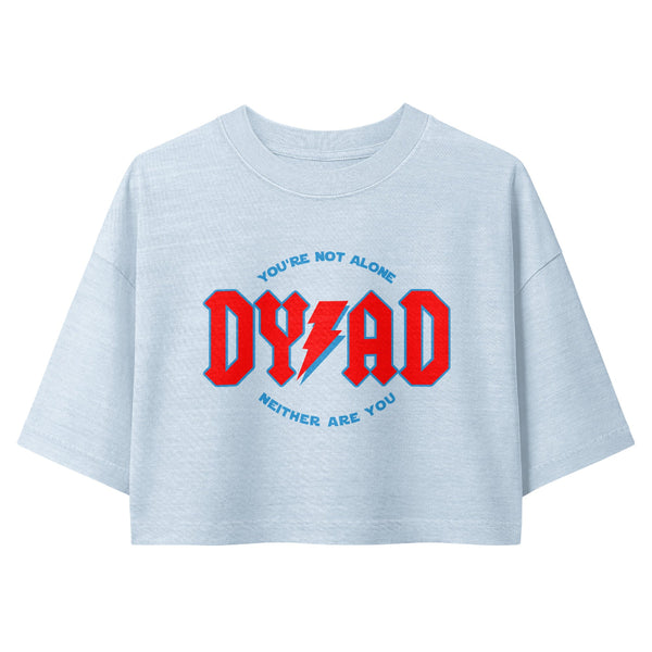 Woman wearing a vintage garment-dyed cropped tee featuring a celestial Dyad in the Force inspired design. Relaxed washed Bella + Canvas cropped t-shirt for Reylo fans, Ben Solo fans, Galaxy's Edge outfits, and subtle fandom fashion.