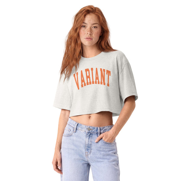 Woman wearing a vintage garment-dyed cropped tee featuring a Loki Variant inspired design. Relaxed washed Bella + Canvas cropped t-shirt for Marvel fans, Avengers Campus outfits, Disneyland trips, and subtle fandom fashion.