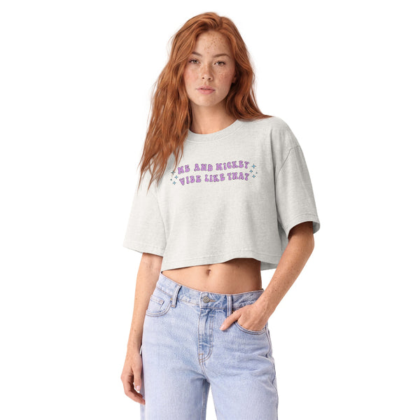 Woman wearing a vintage garment-dyed cropped tee featuring a Karma x Mickey inspired design. Relaxed washed Bella + Canvas cropped t-shirt for Swifties, Disney adults, Disneyland outfits, and Disney World vacations.